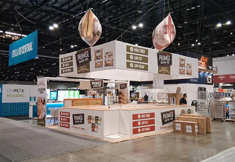 20x20 trade show exhibit designed and built for Promise at IDDBA 2026 in Orlando